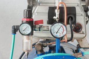 image of a pressure gauge and air filter regulator on Air Pump