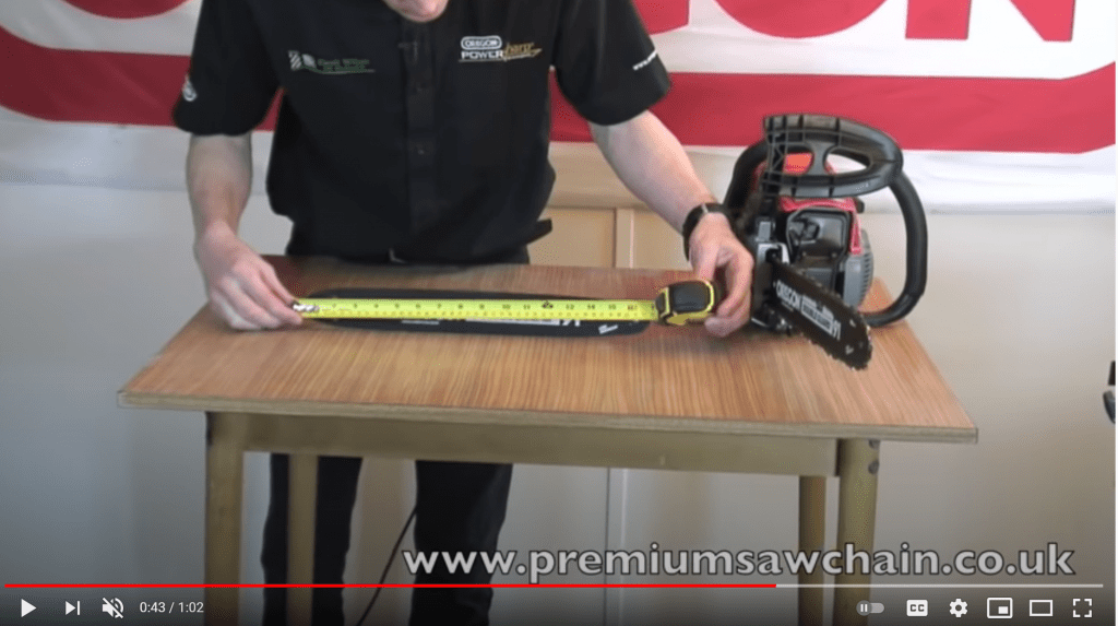 still from youtube video on measuring chainsaw bar. 