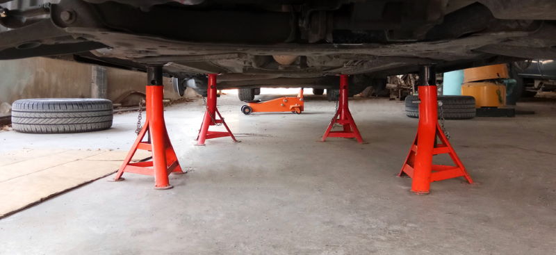 image of 4 jack stands supporting car