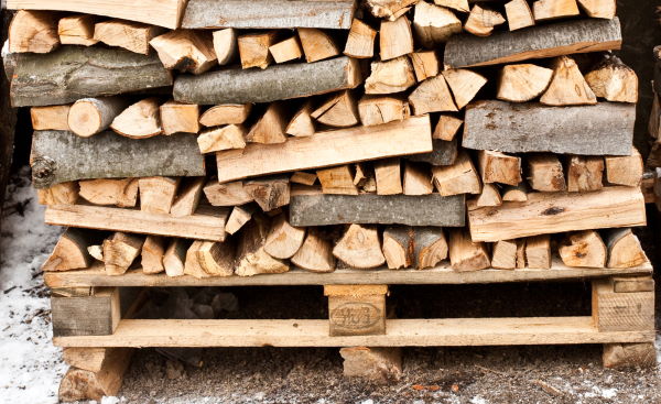 image of pallets used to keep firewood off ground