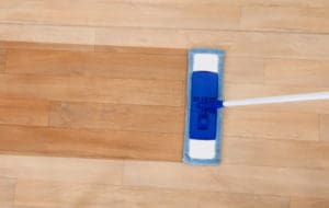 demonstration of mopping wood floors